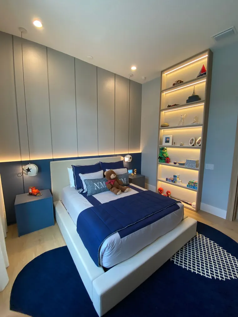 Kids room with lit shelving