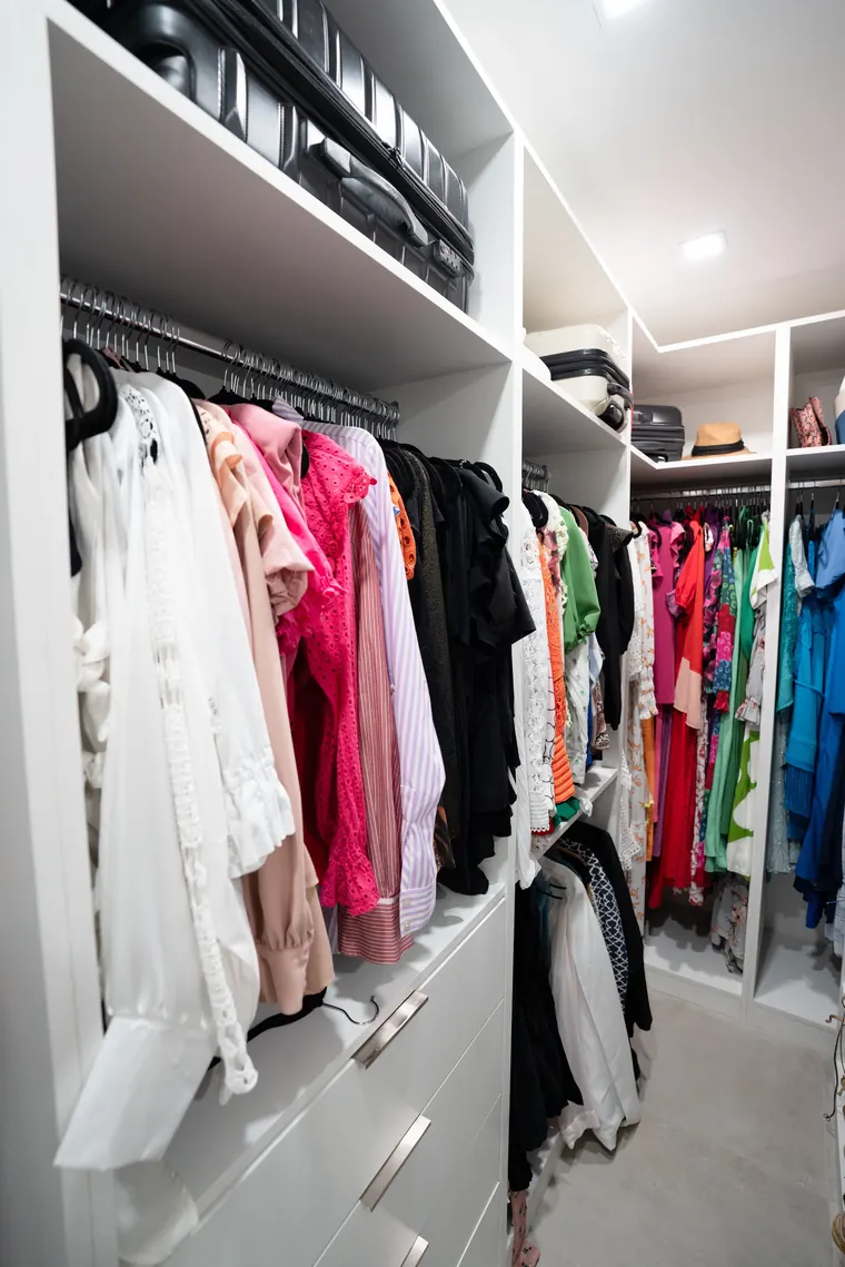 Walk-in closet with lit hanging